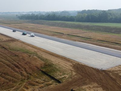 5 - Over 21,000 tons of FAA P-401 hot mixed asphalt placed for new runway